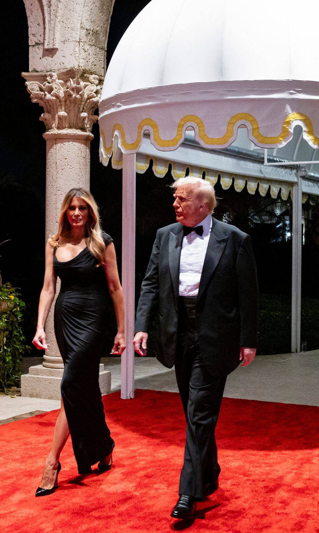 U.S. President-elect Donald Trump and his wife Melania Trump arrive on New Year's Eve at his Mar-A-Lago Club on December 31, 2024 in Palm Beach, Florida.