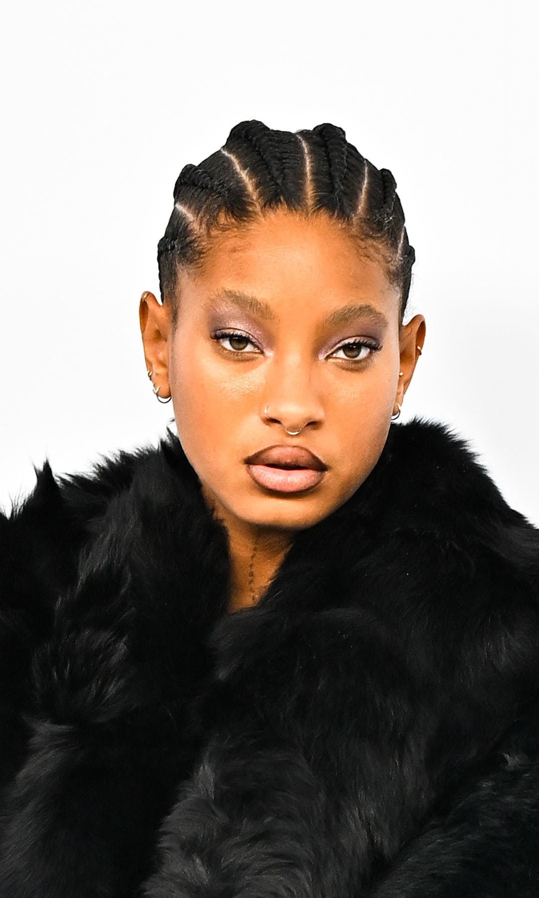 Willow Smith steps out in black bodysuit and thigh-high stockings in latest Paris Fashion Week outing [PHOTOS]