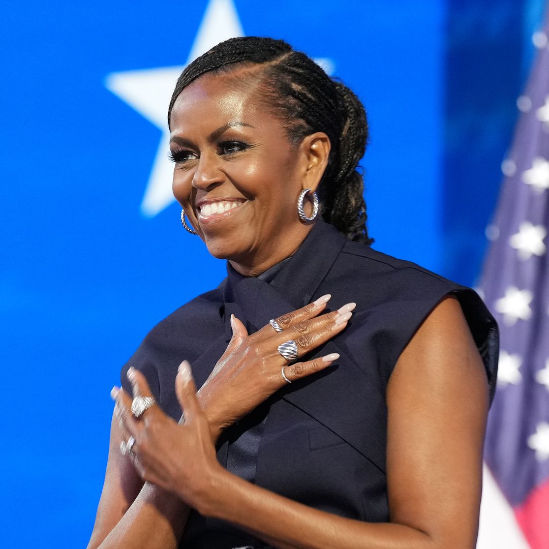 Michelle Obama looked effortlessly cool in a crisscross sleeveless suit at the 2024 DNC