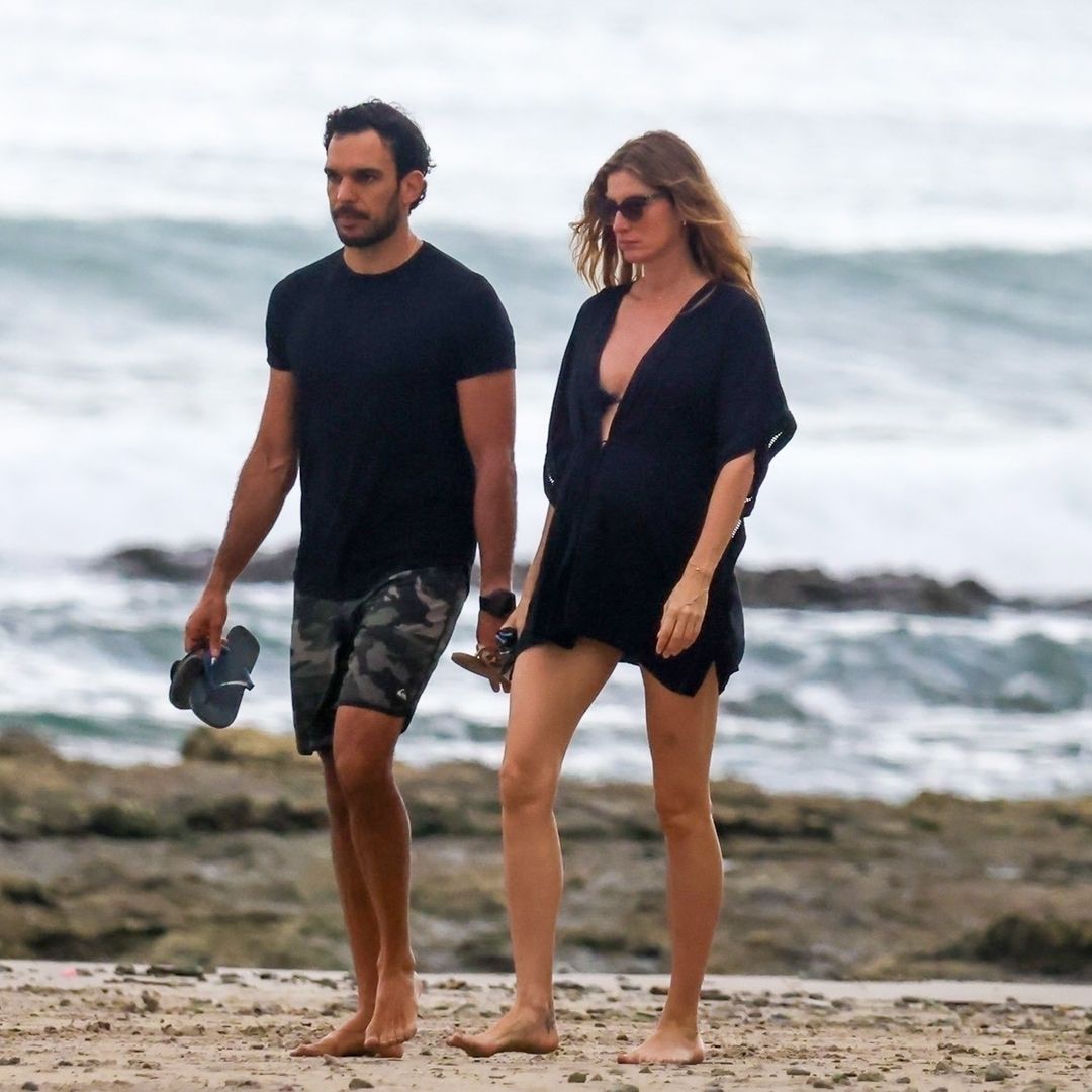 Watch Gisele Bündchen and Joaquim Valente enjoy their beach day with strolls and surfing