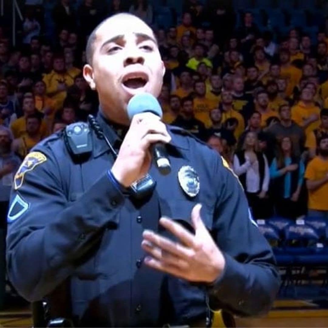 Police officer and former 'American Idol' contestant impresses crowd with the 'National Anthem'