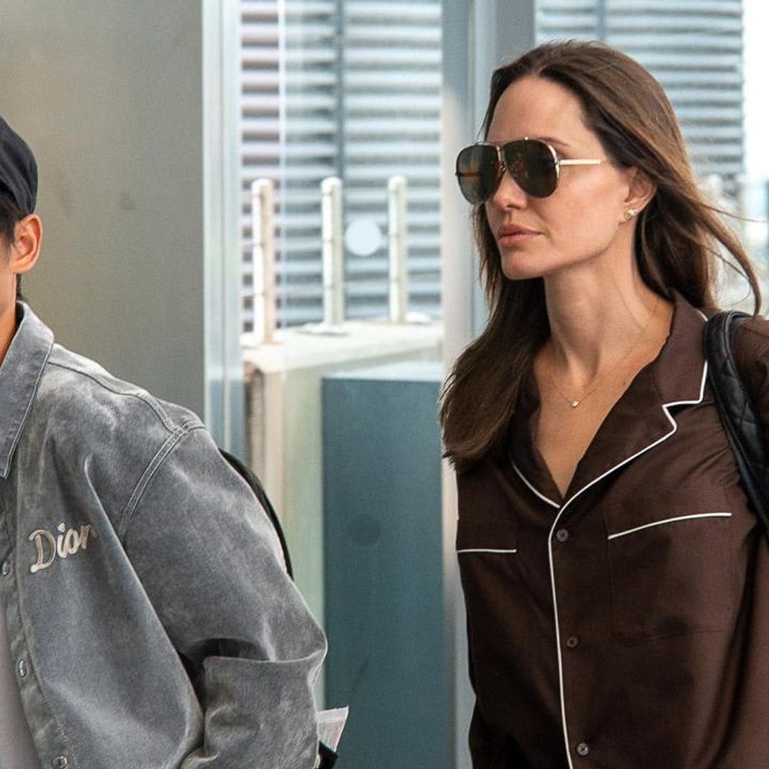 Angelina Jolie & Pax board a flight in their pajamas