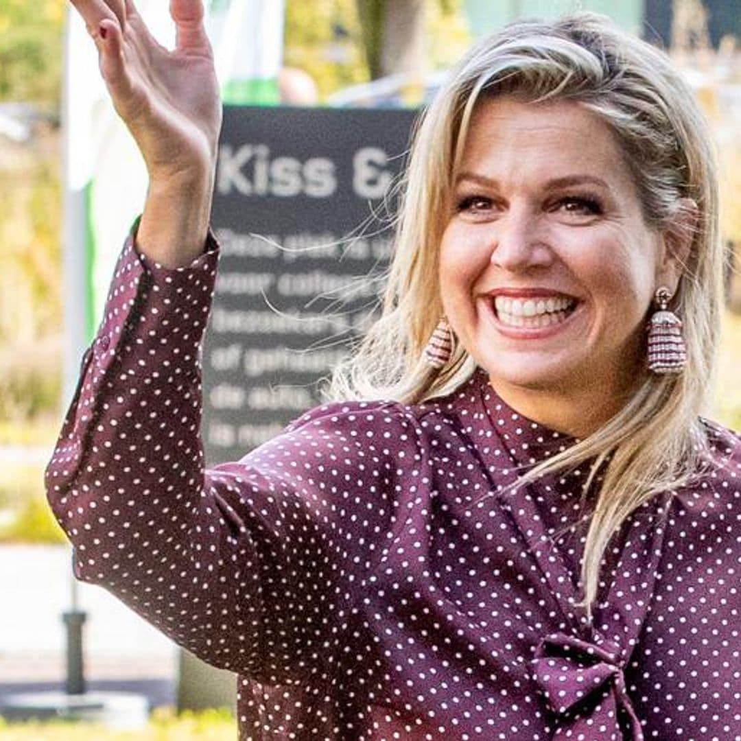 Queen Maxima wows in head-to-toe berry and leather trousers