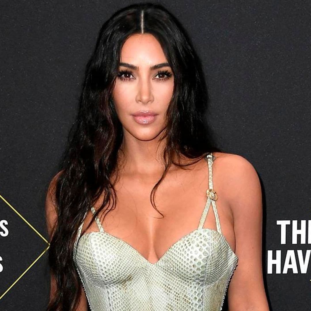 Kim Kardashian went night swimming in a sexy snake print string bikini