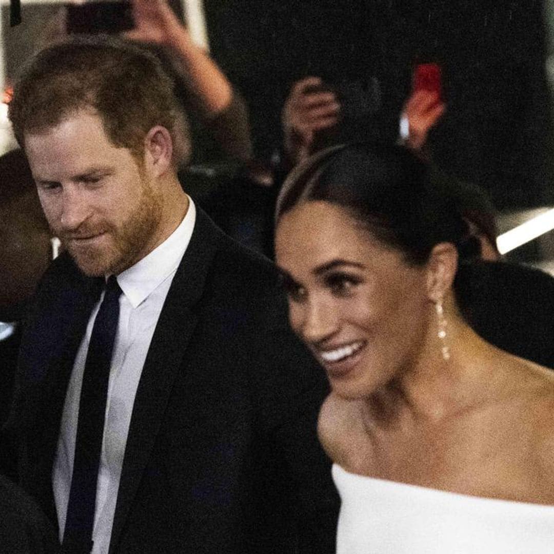 Meghan Markle and Prince Harry spotted out smiling following report of eviction