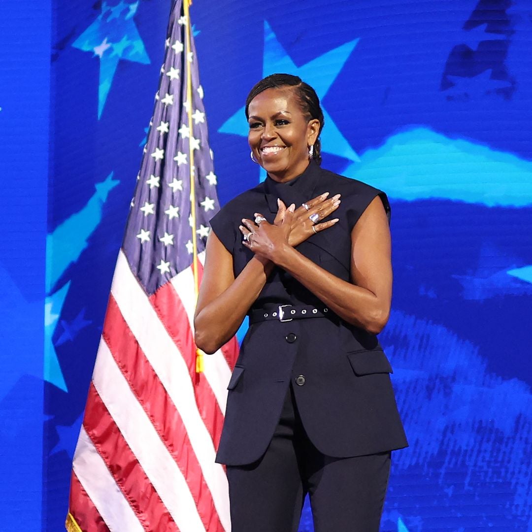 Michelle Obama's sophisticated navy blue suit at the DNC is a creation of Dominican designer Fernando García