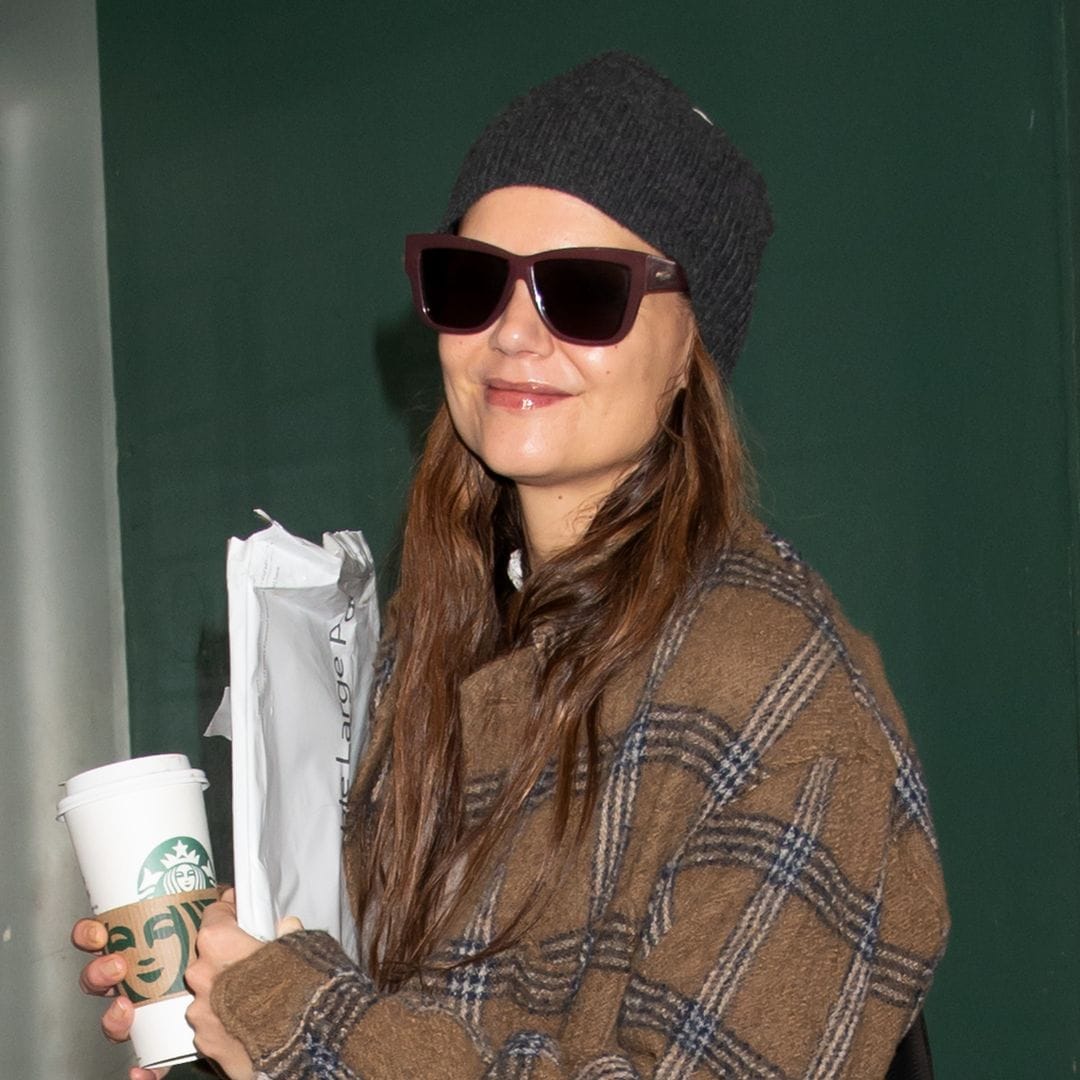 Katie Holmes hugs her costar as she nears the end of 'Our Town' on Broadway