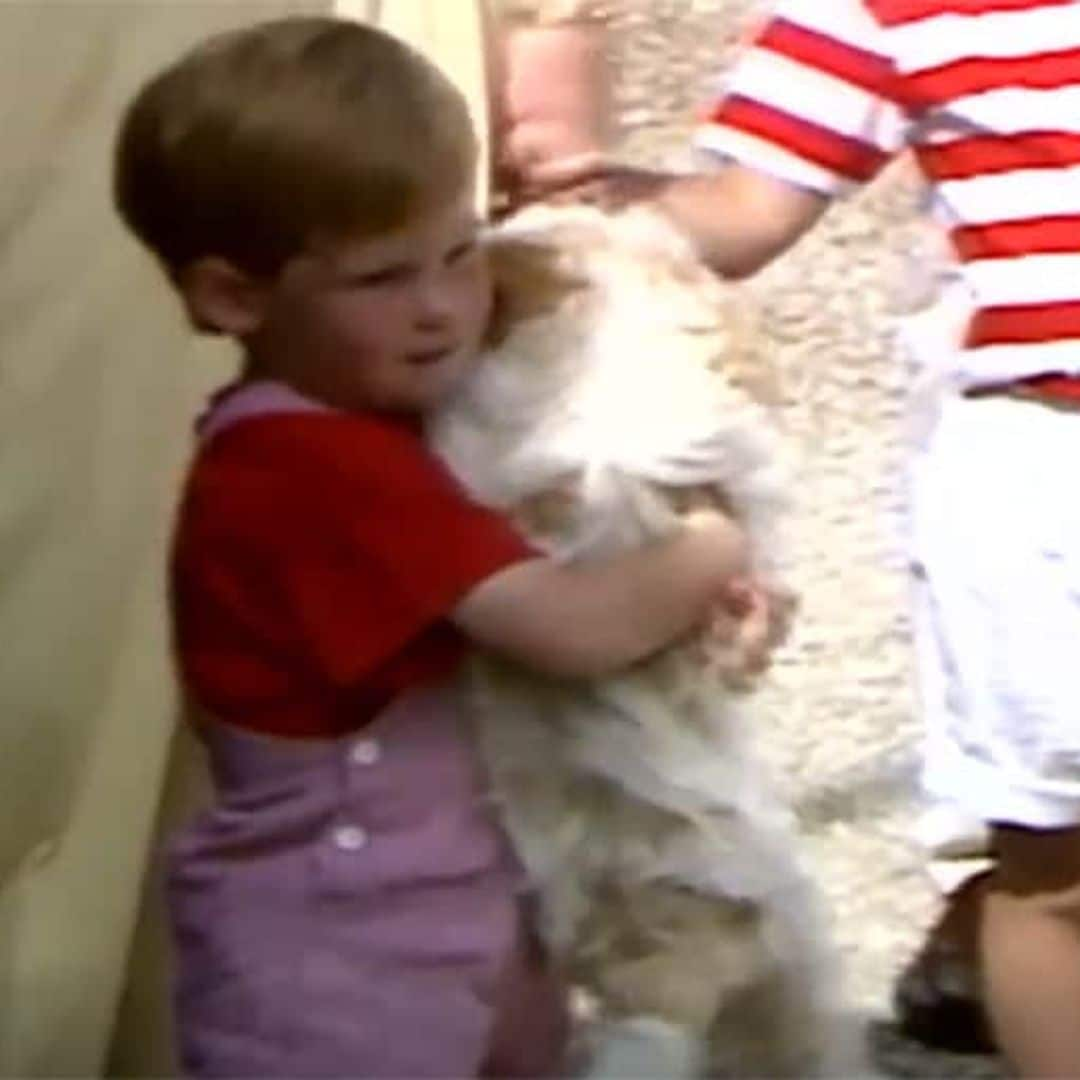 Prince Harry playing with a puppy as a toddler is just the cutest - watch video