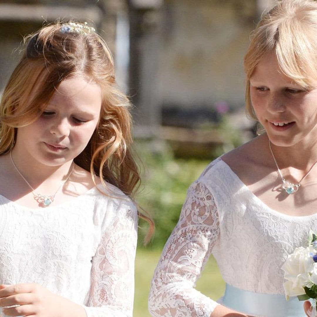 Queen Elizabeth’s great-granddaughters are adorable bridesmaids at family wedding