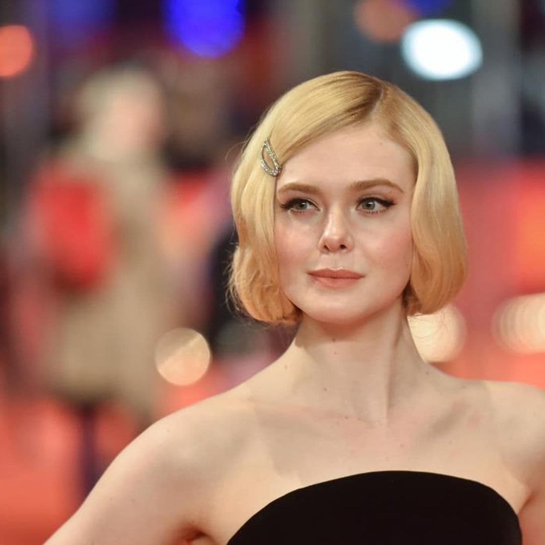 Elle Fanning dresses up as Brad Pitt and we can’t stop staring at the beard braids!