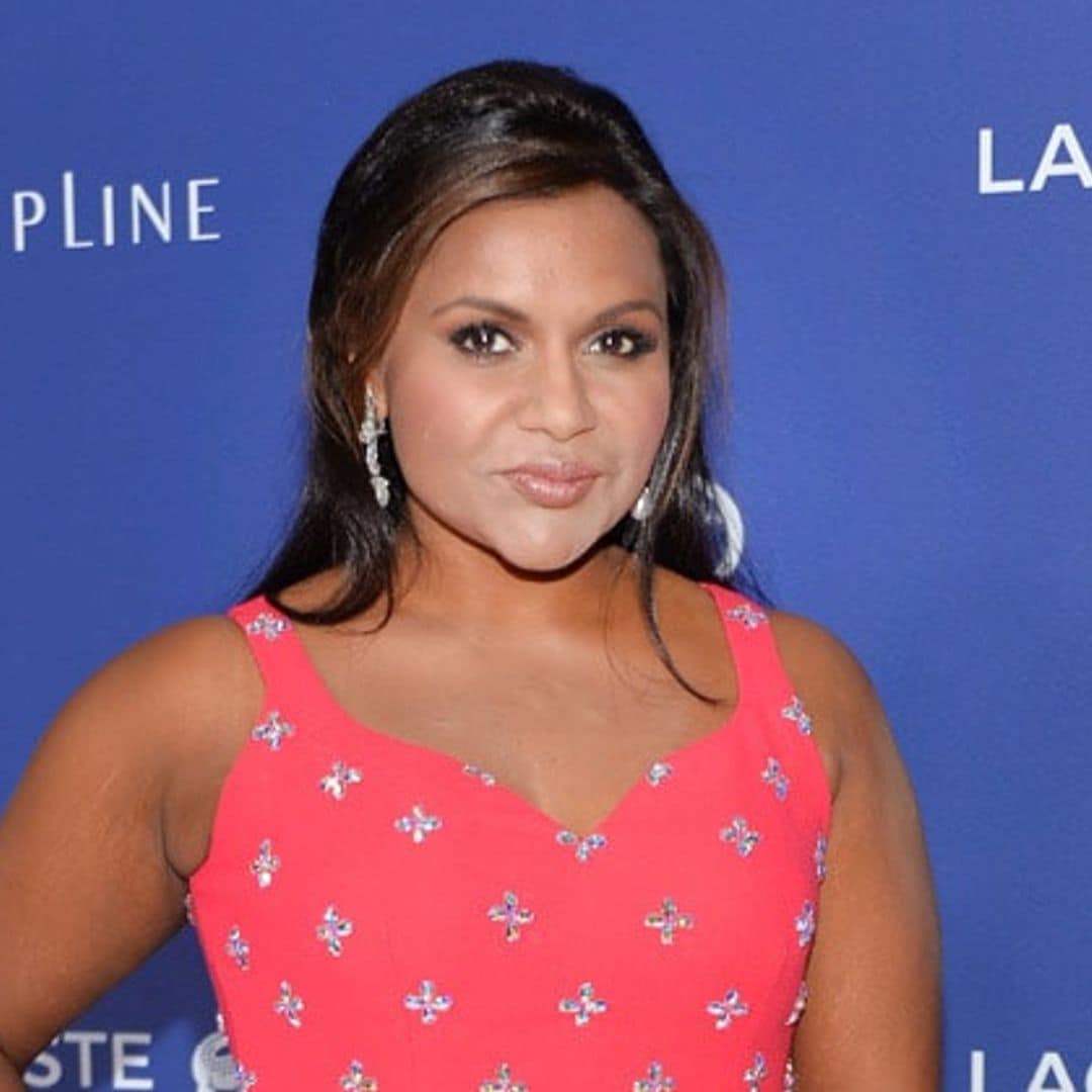 Mindy Kaling shows her Spanx before the 2016 Costume Designers Guild Awards