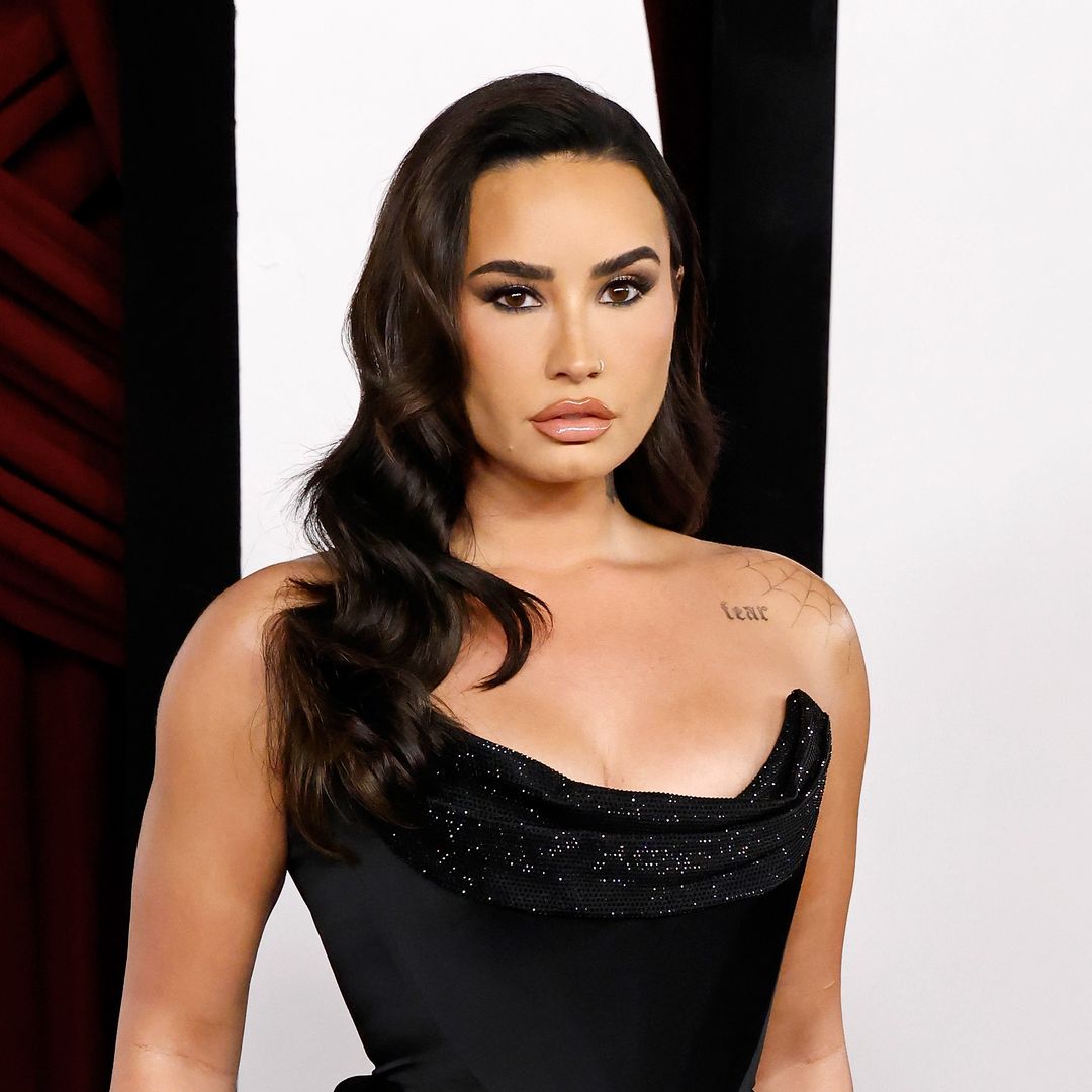 Demi Lovato wears black corset and sheer tights in latest outing with her fiancé Jutes