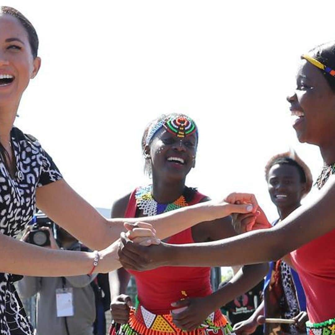 Dancing Duchess Meghan says she is visiting Africa as 'a woman of color'