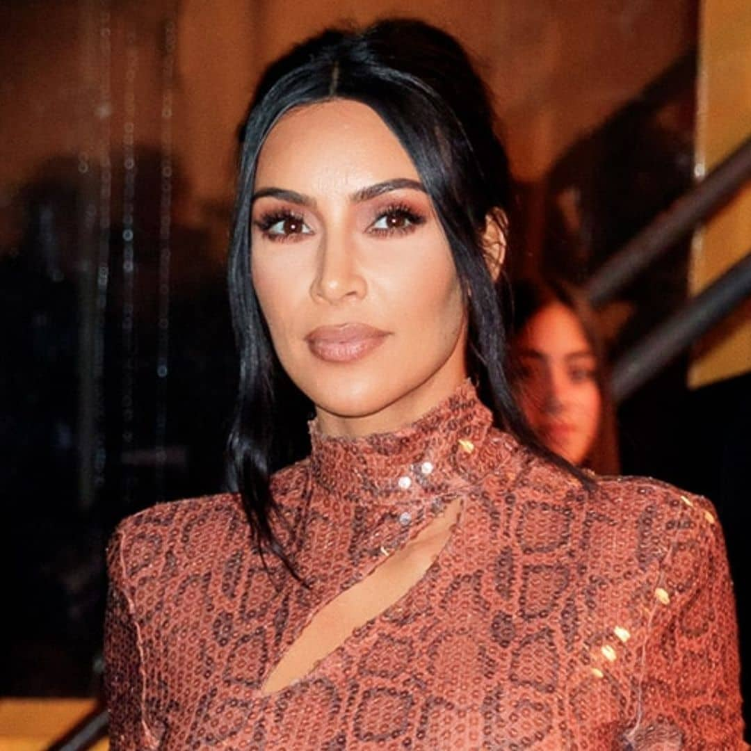 Kim Kardashian stuns in daring unitard as she celebrates opening of center named after her late father