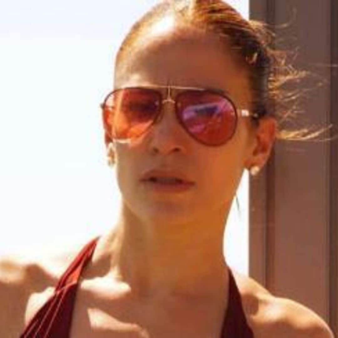 Jennifer Lopez shows off her beach body in red hot swimsuit