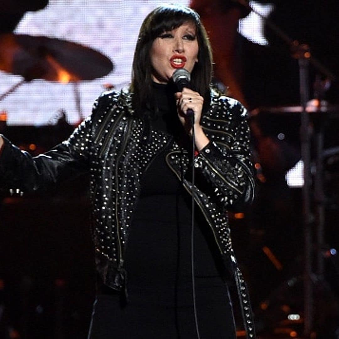 Singer Karen O reveals pregnancy, stuns in rocker chic fashion