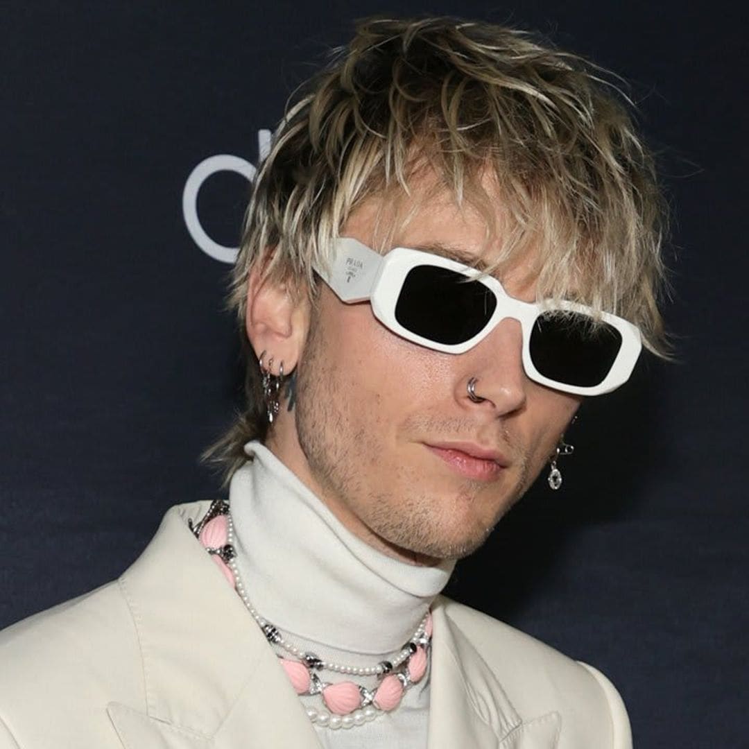 Machine Gun Kelly loses $100 to a fan who bet she was taller than him