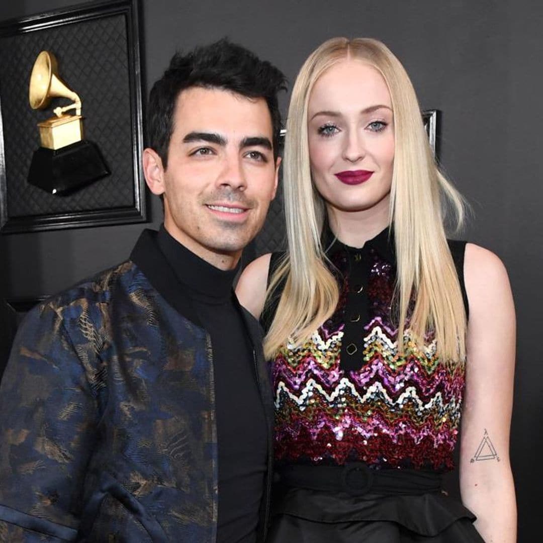 Sophie Turner shows off her growing baby bump during walk with Joe Jonas