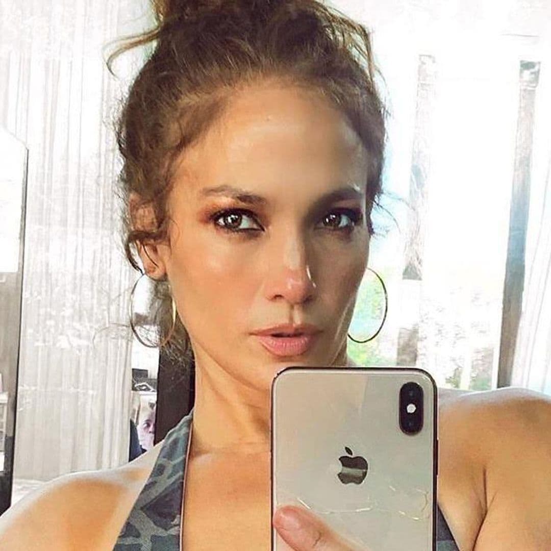 Jennifer Lopez shows off incredible six-pack abs in cute camo crop top and matching leggings