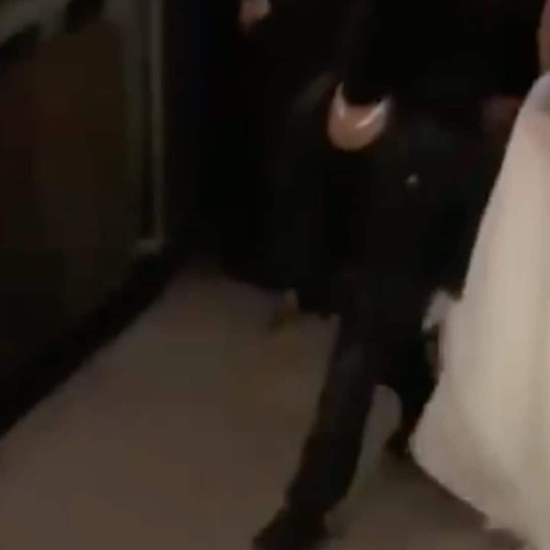 Kim Kardashian wears a wedding dress and leaves Donda event holding Kanye West’s hand