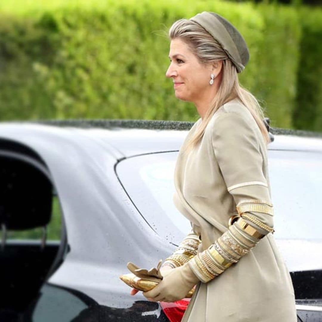 Queen Maxima's boldest look: who needs accessories with a dress like this?