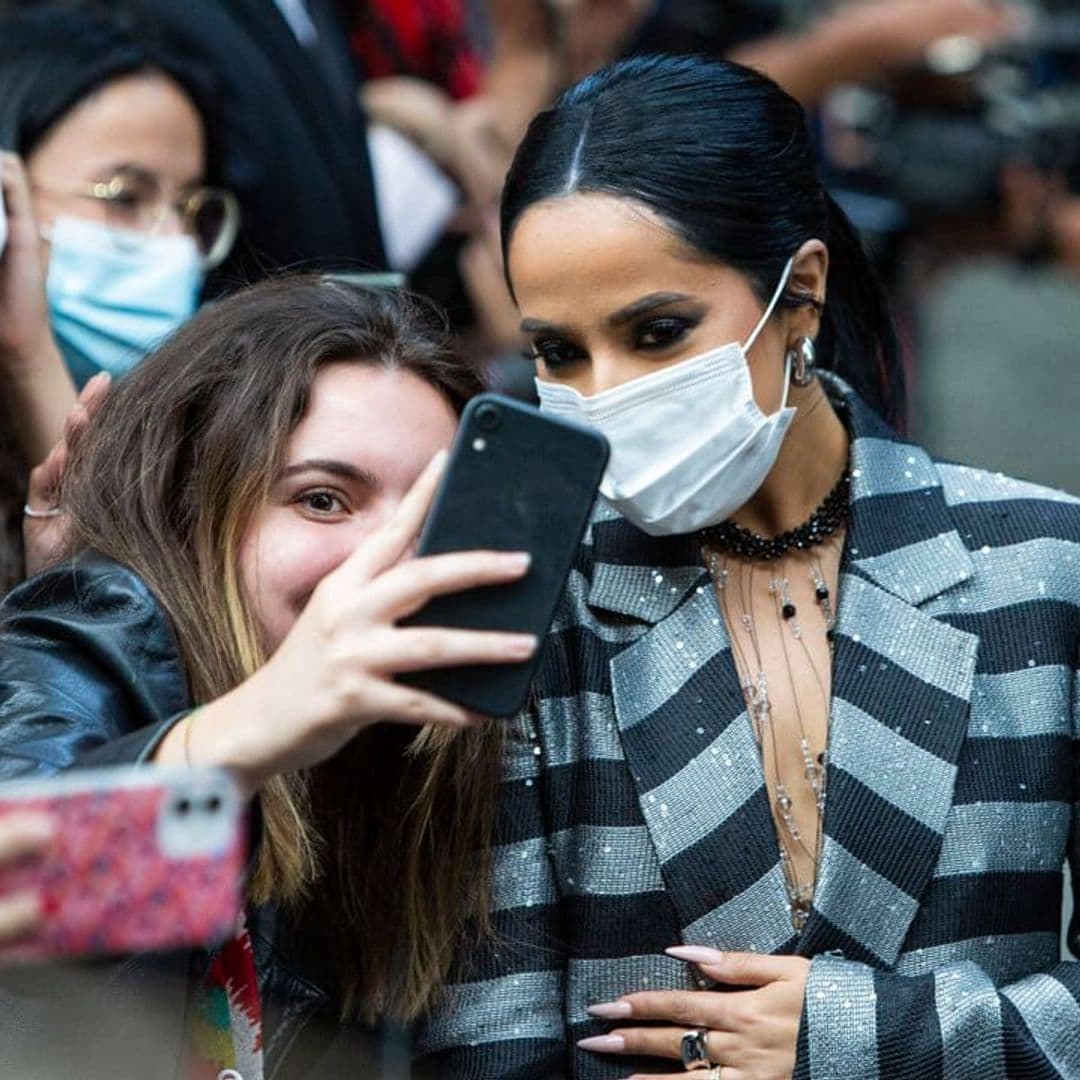 Becky G wore a trendy oversized pantsuit front row at Milan Fashion Week