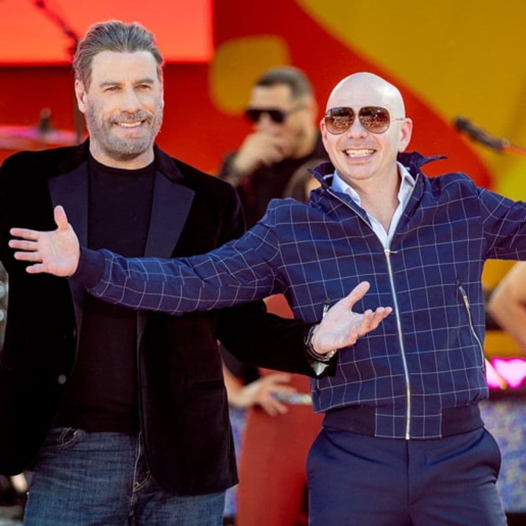 John Travolta pulls the ‘ultimate switch’ in Pitbull’s '3 to Tango' music video