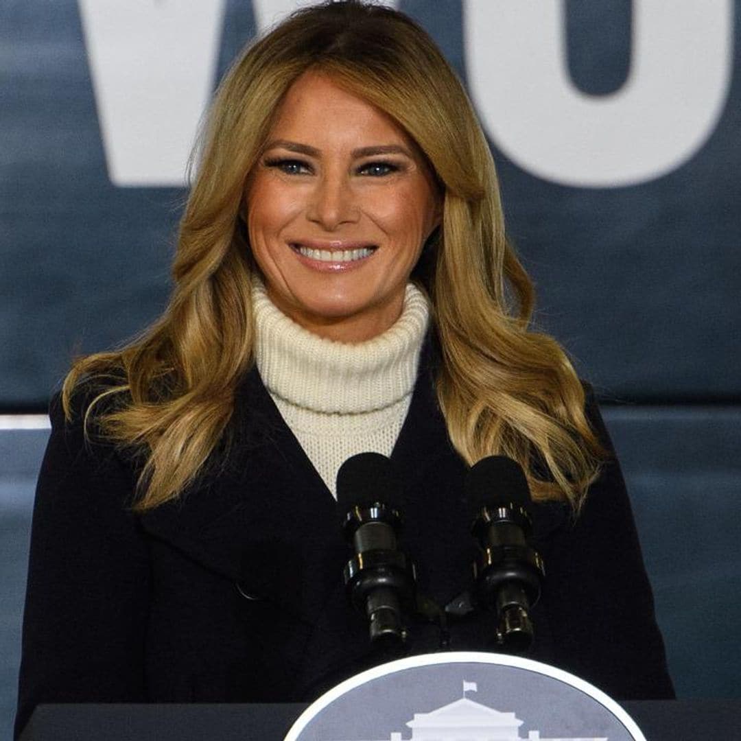 First Lady Melania Trump spreads holiday cheer wearing festive heels!