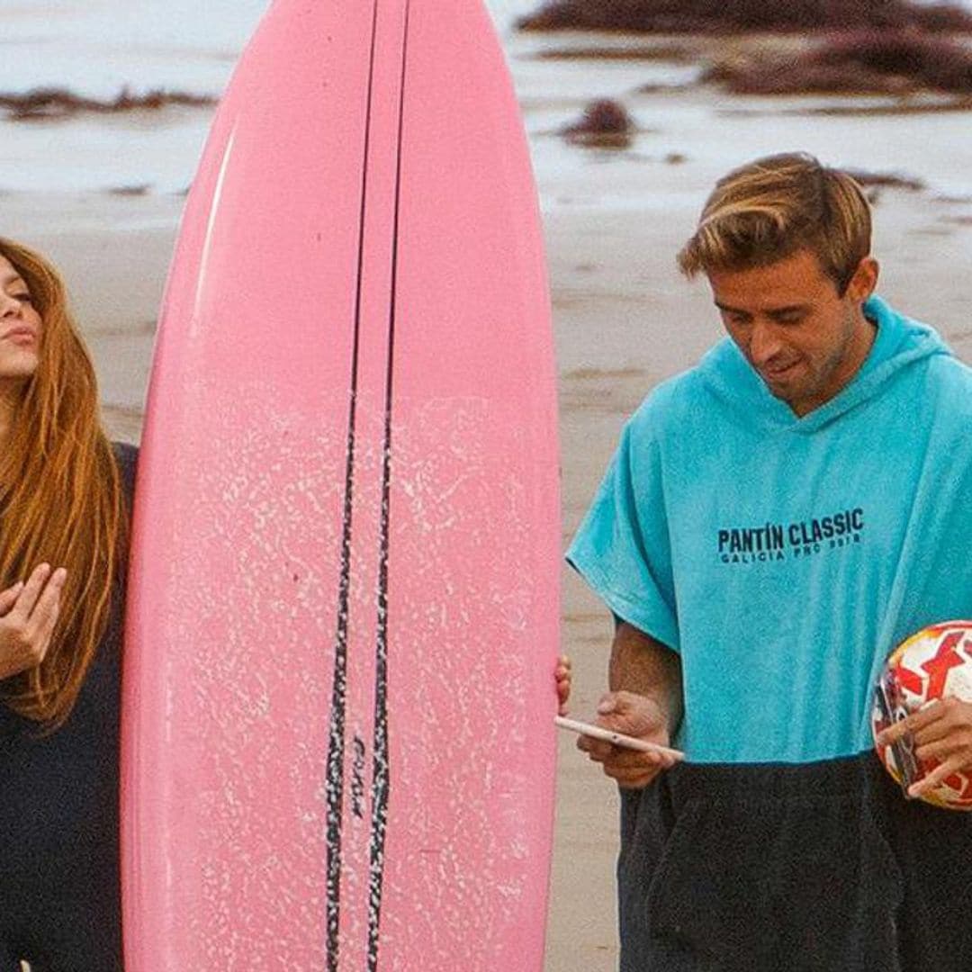 Shakira photographed with her kids and a hot surf instructor