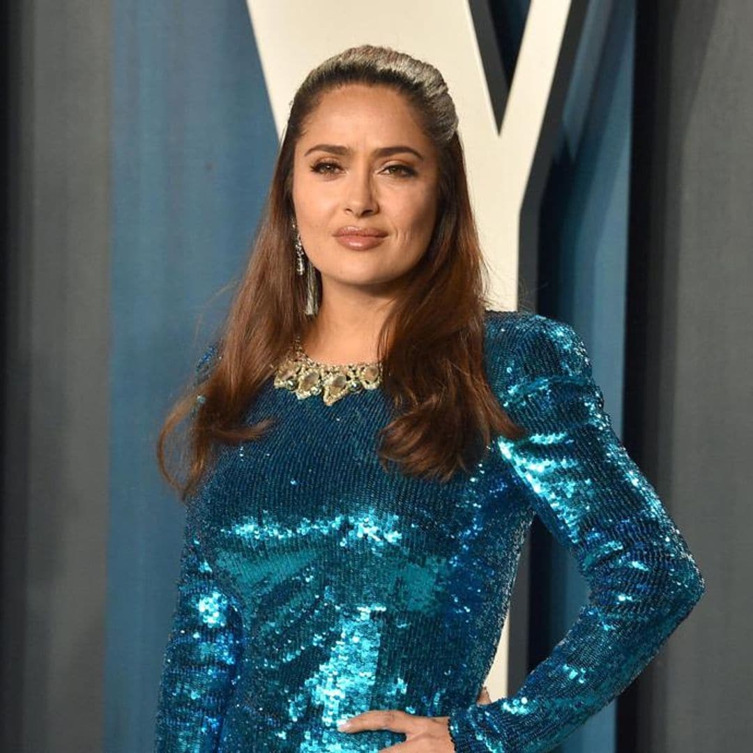 Salma Hayek hilariously spills water on rapper Eminem backstage at the Oscars - see the photos!