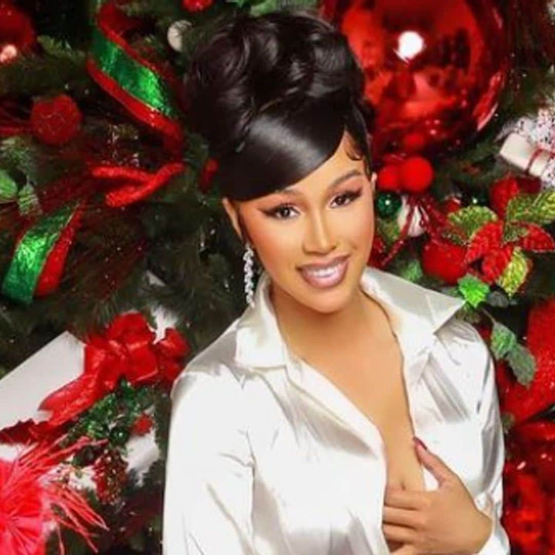 Cardi B enjoys Christmas Eve surrounded by family, stunning decorations, and a new puppy