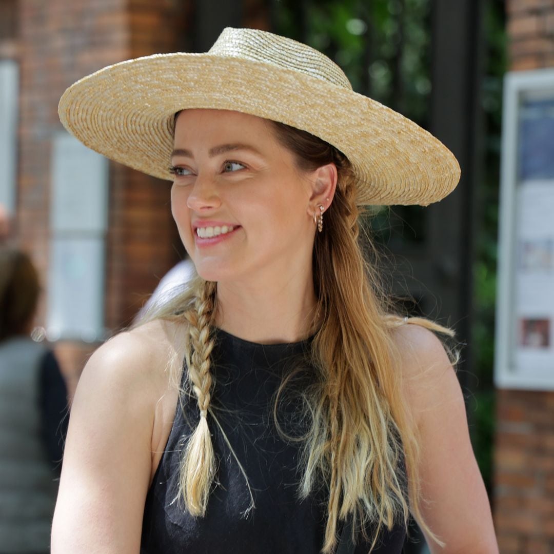 Amber Heard, expecting her second child, shares her love of Madrid in perfect Spanish