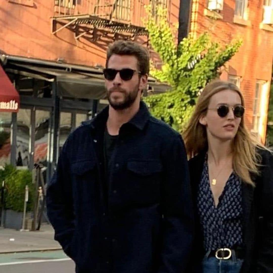 Liam Hemsworth's cuddles up to new girlfriend Maddison Brown - see the pics!