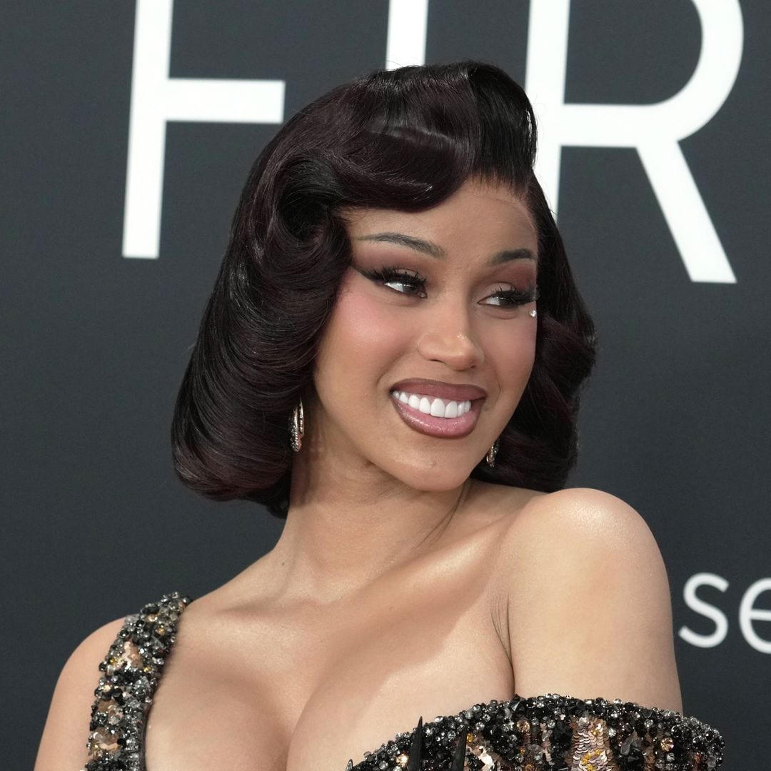 Cardi B channels old Hollywood glamour in figure-hugging gold dress at the Grammys