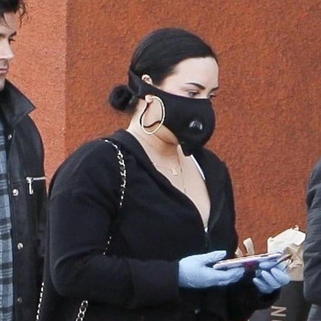 Demi Lovato wears futuristic face mask as she steps out to shop