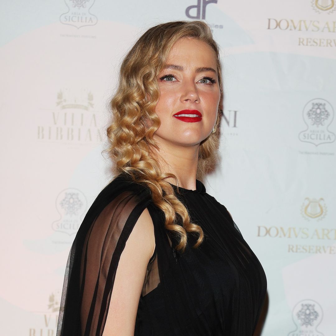 Amber Heard embraces the Holidays in Spain with her mini-me