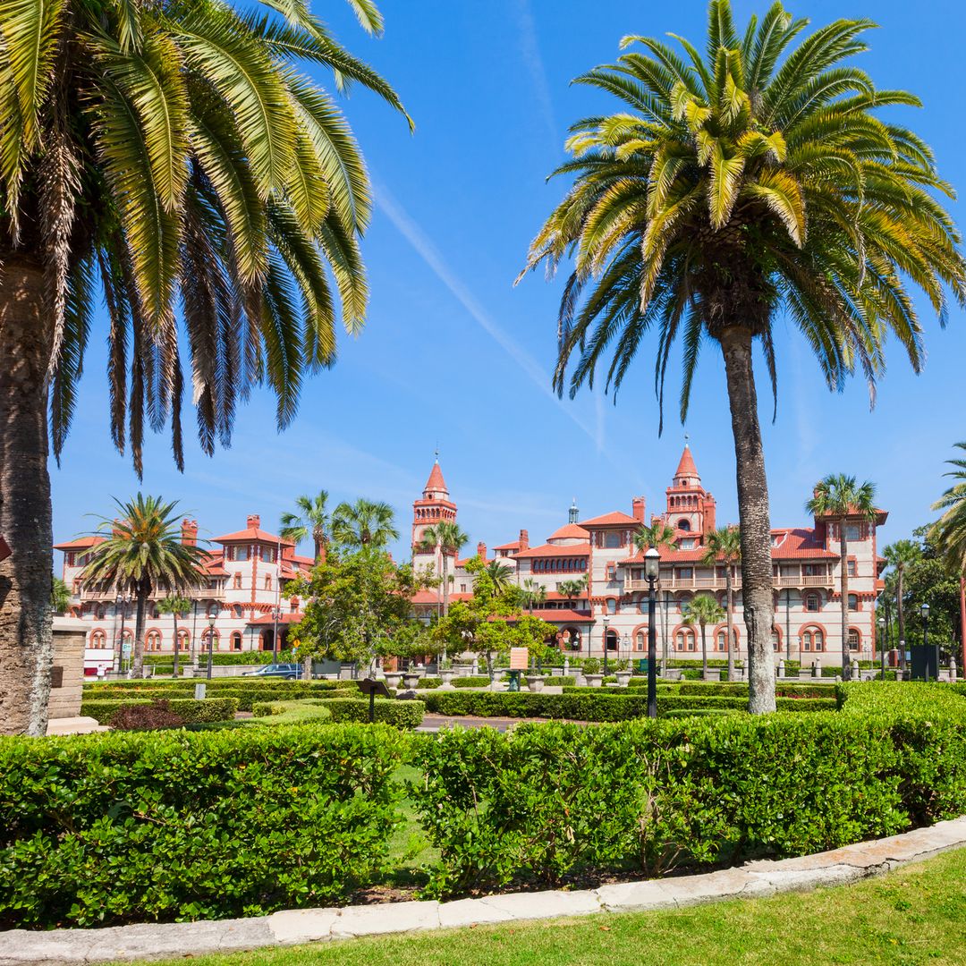 Beautiful park in downtown St Augustine, Florida with the Flagler College main building in the background.