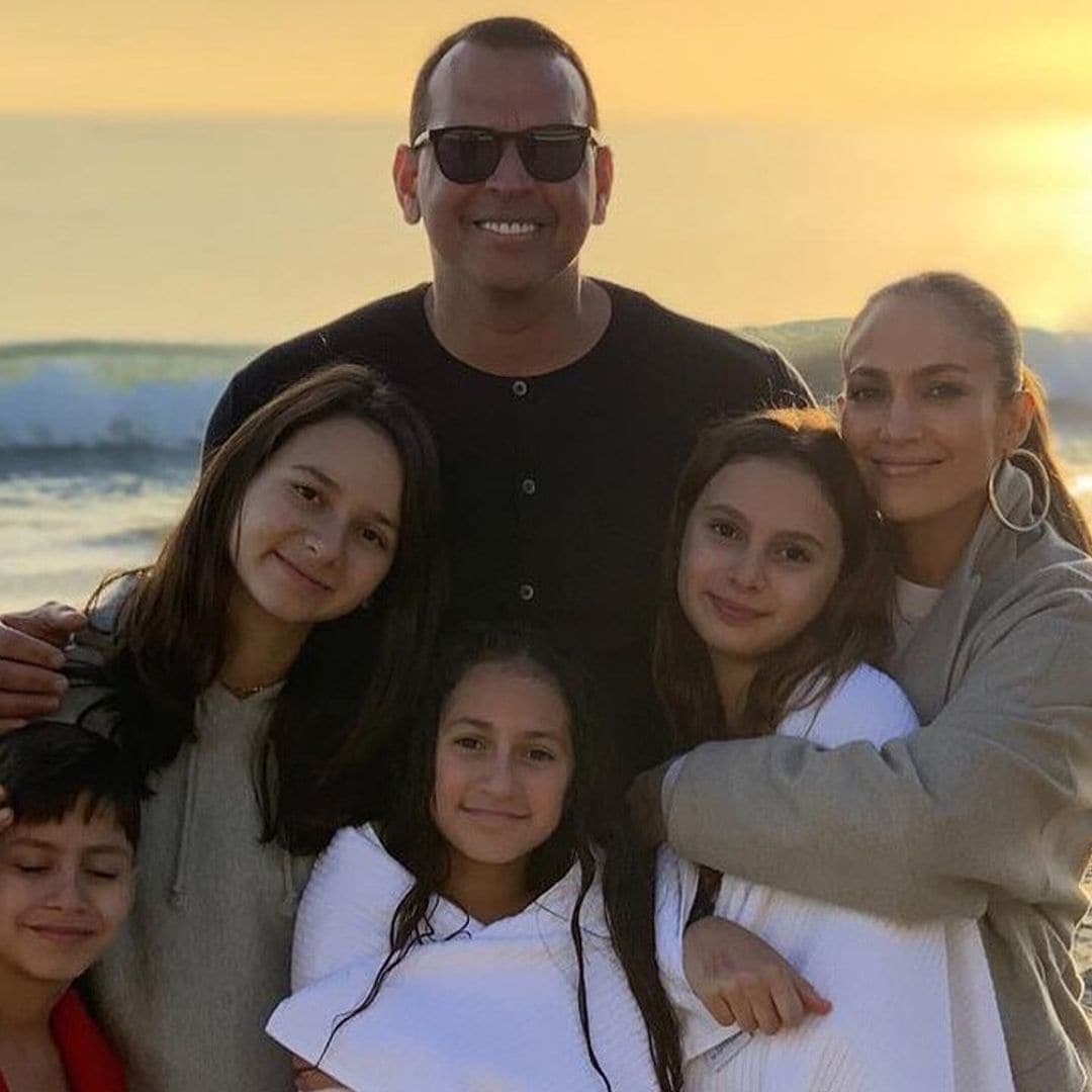 Reunited: JLo cuddles up with twins for delicious celebratory dinner at home with A-Rod