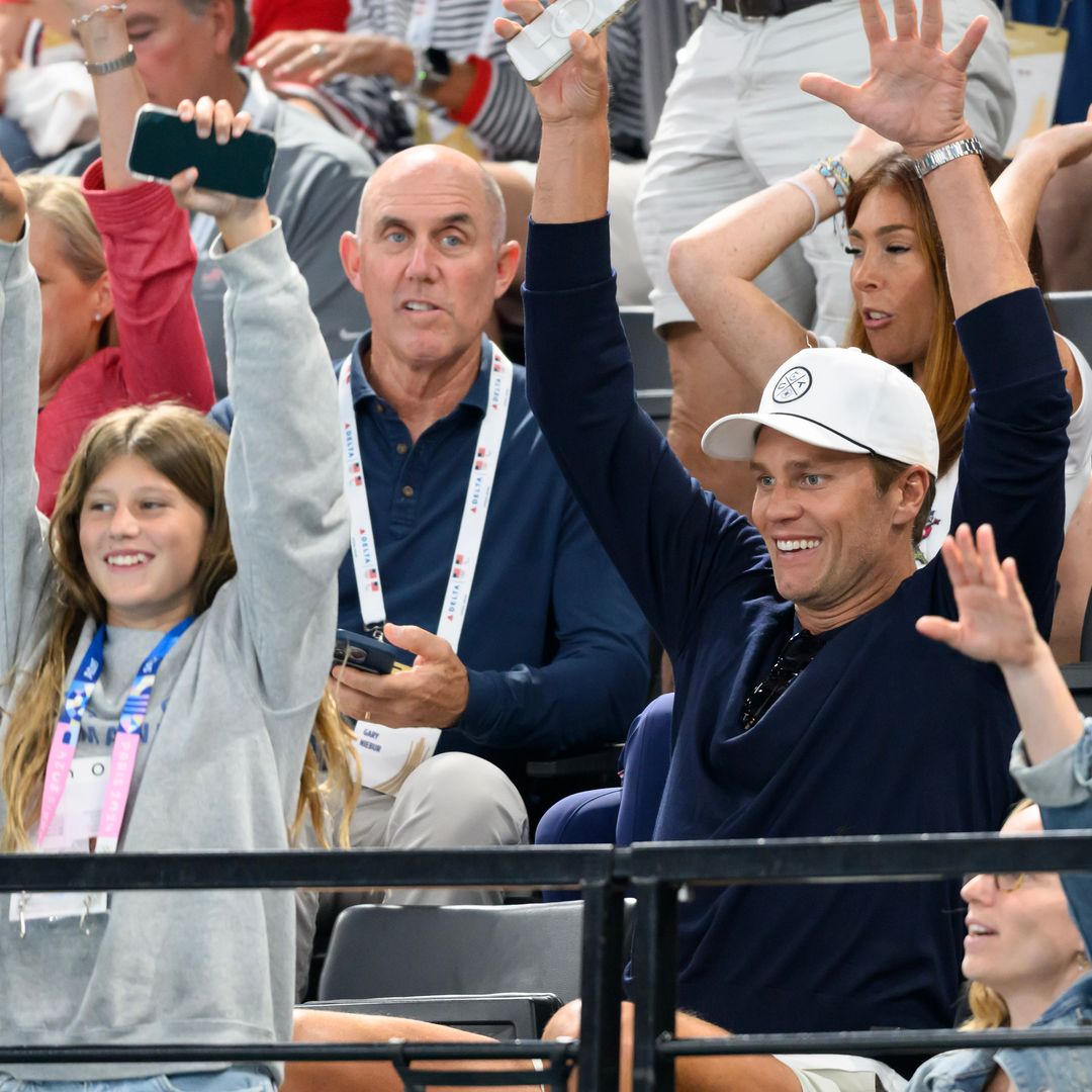 Girl dad, Tom Brady, and daughter Vivian cheer on gymnastics legend Simone Biles