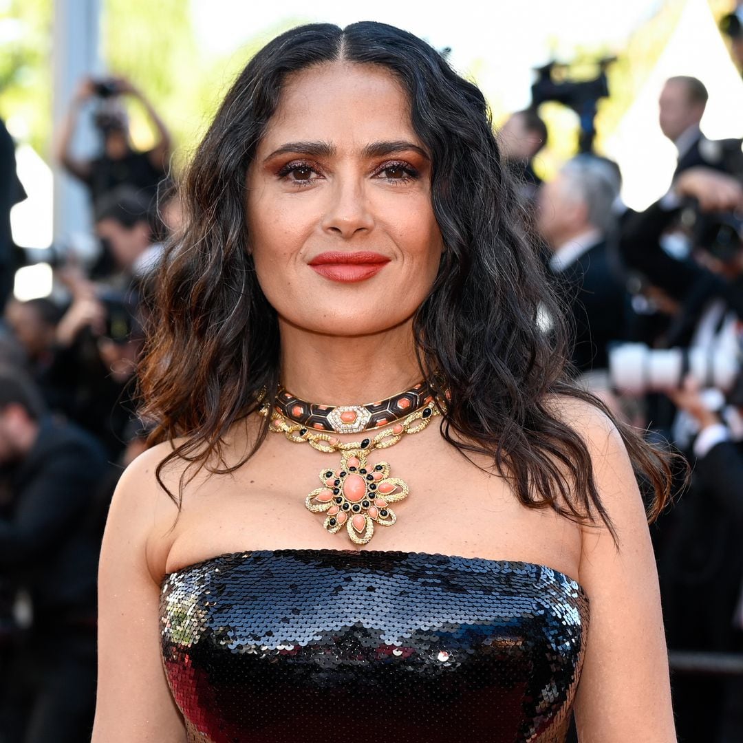 Salma Hayek and her dangerous curves dive into August in a bold bikini