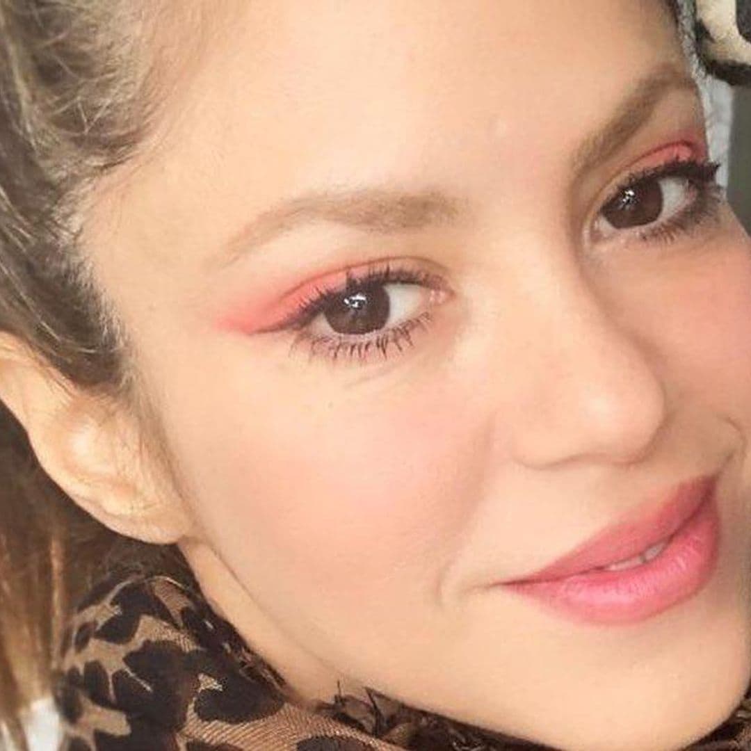 Shakira channels her inner makeup artist and plays around with orange shadow