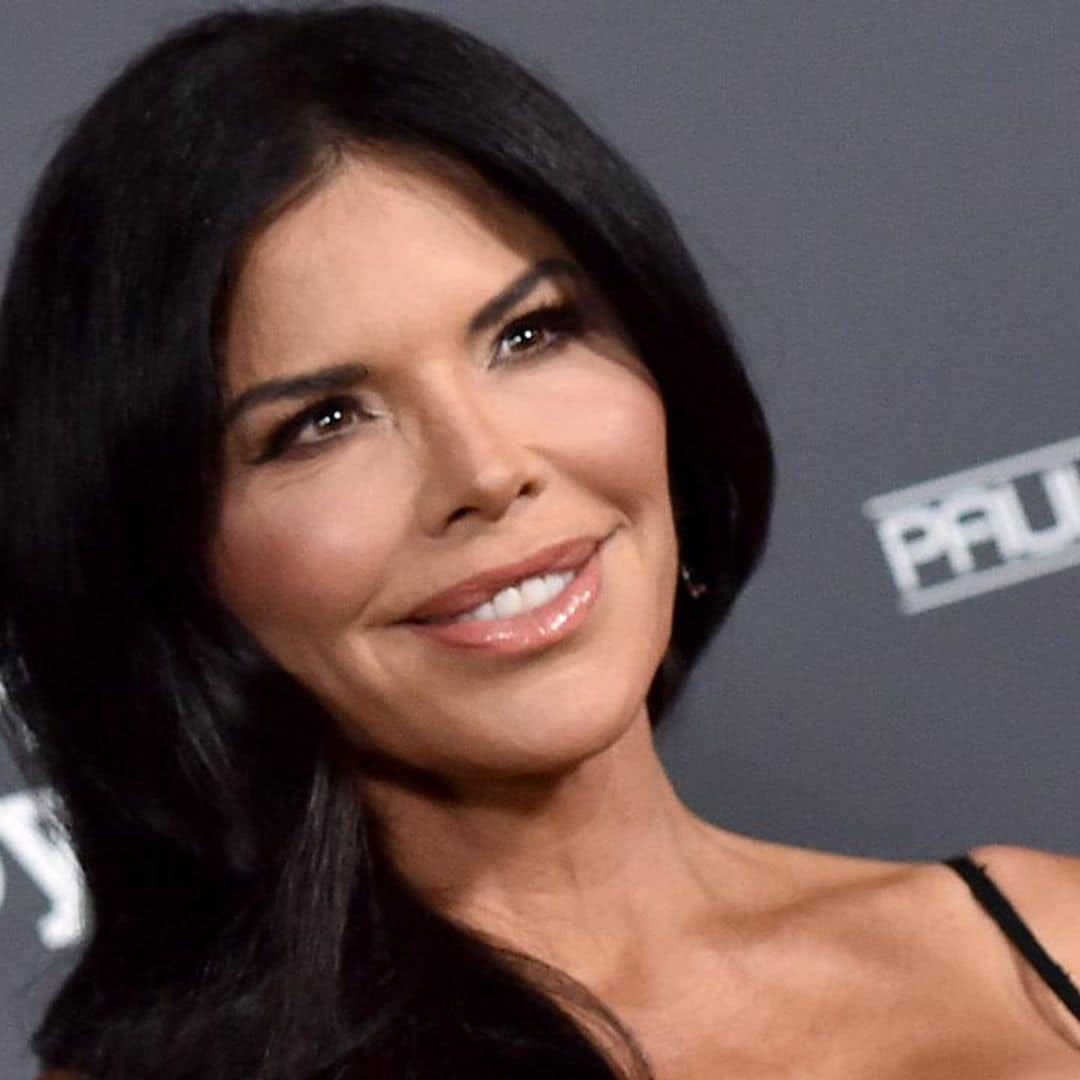 Lauren Sanchez shows off her press-on nails while flying a helicopter