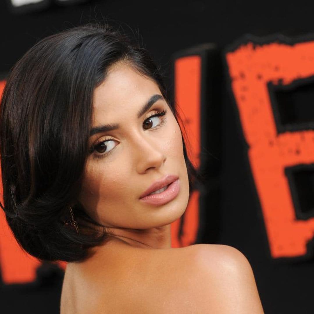 Diane Guerrero is pondering retouching her wrist tattoo in support of trans lives