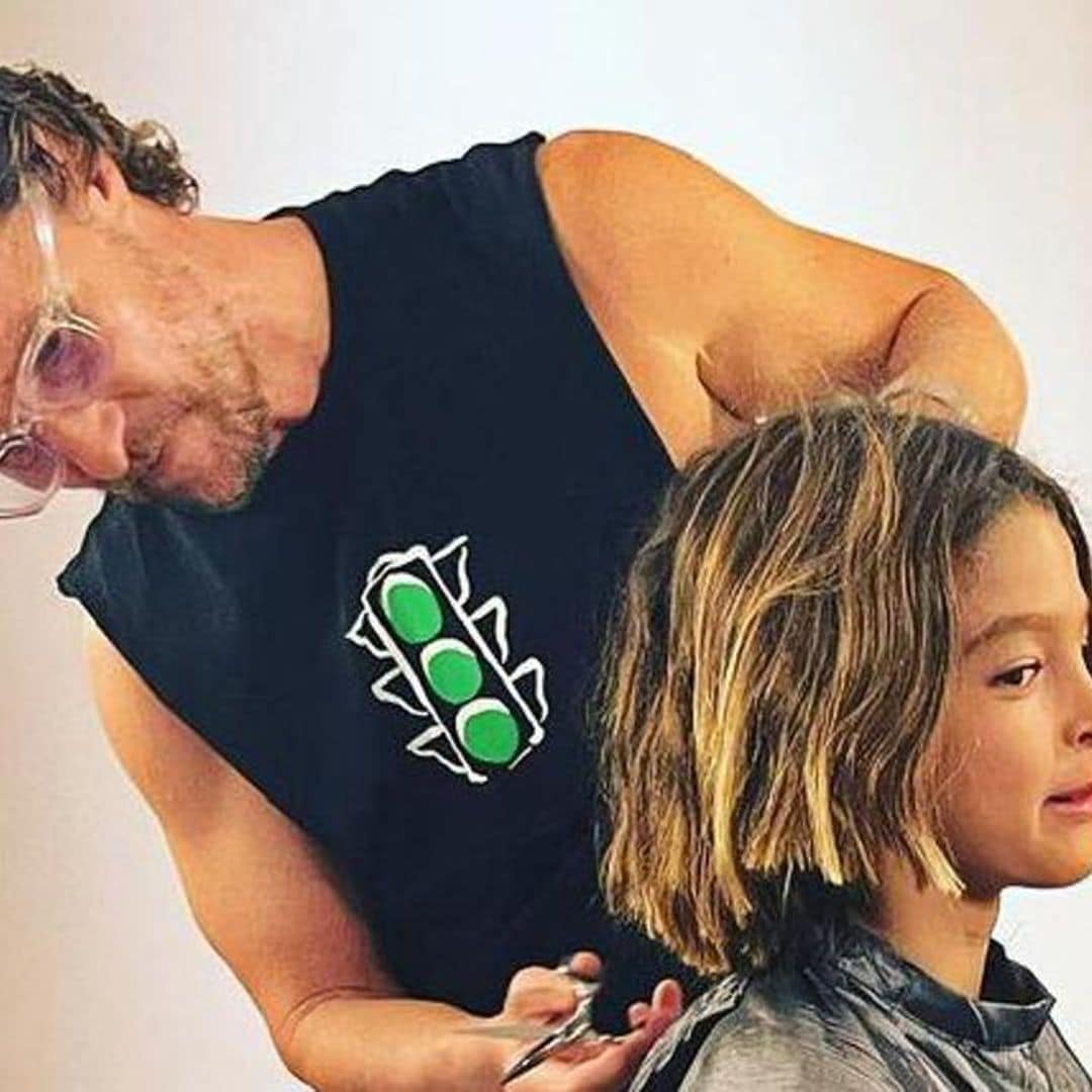 Matthew McConaughey plays barber and gives his son Livingston a haircut