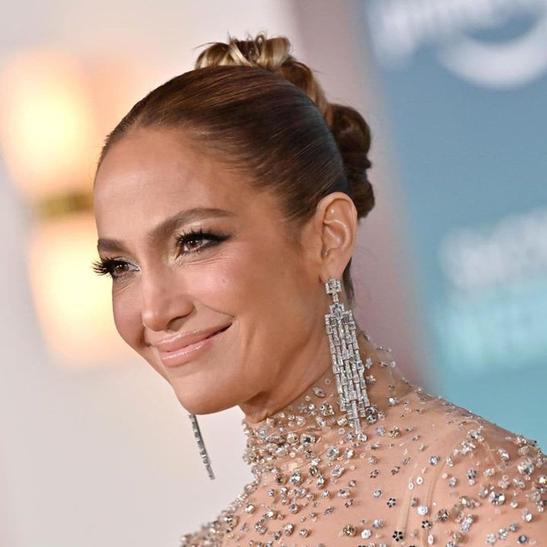 What was Jennifer Lopez doing while Marc Anthony was getting married to Nadia Ferreira?