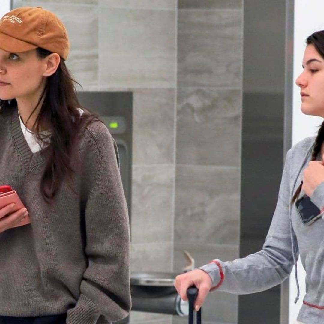 Katie Holmes and Suri Cruise spotted boarding a flight in Los Angeles