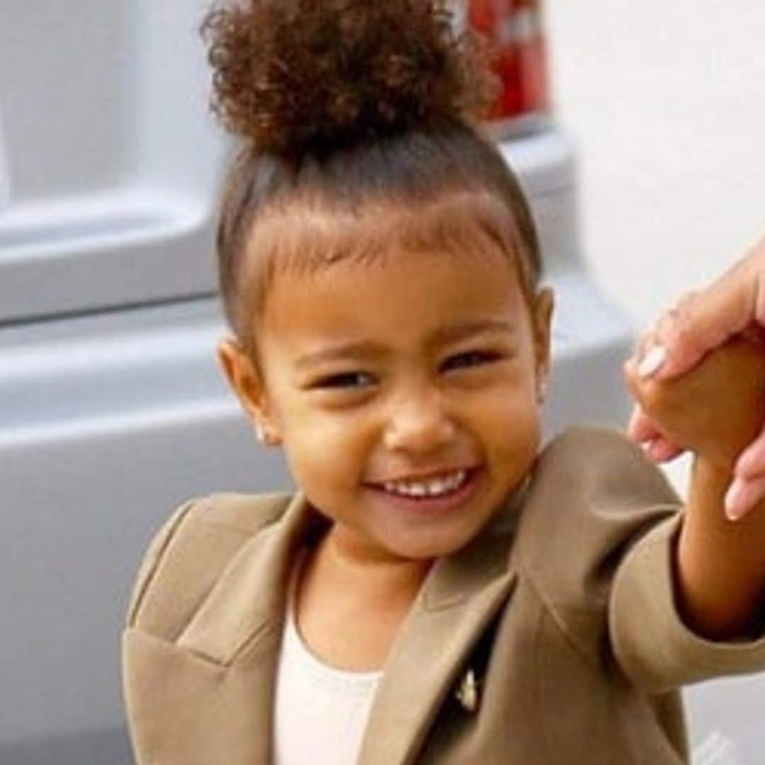 North West receives custom dress from designer Julien Macdonald