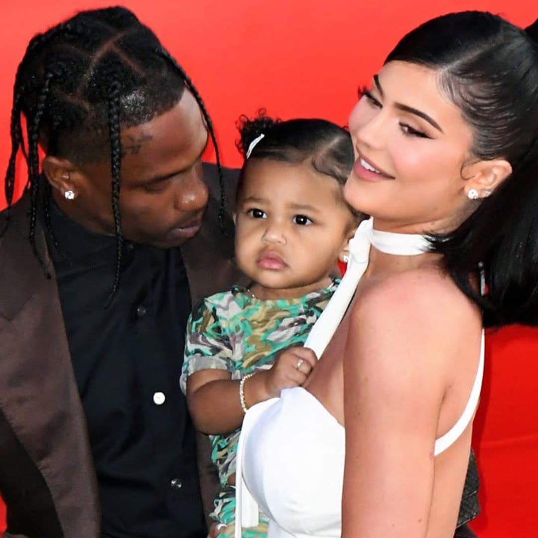 Stormi Webster has a water balloon fight with parents Kylie Jenner and Travis Scott