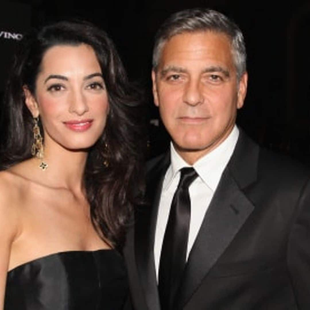 George Clooney full of jokes and smiles as he shoots down Amal pregnancy rumors