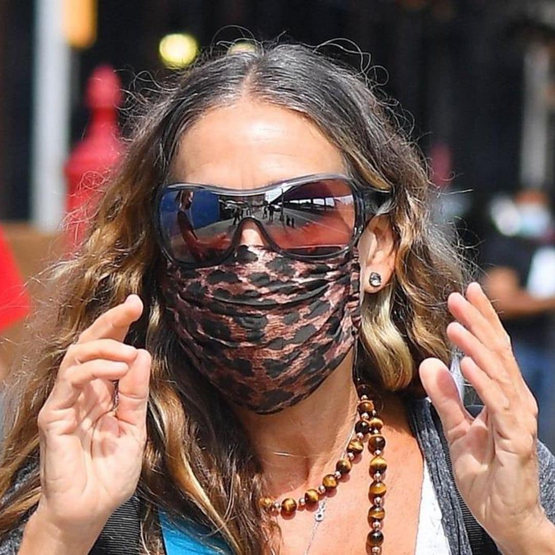 Sarah Jessica Parker visits and greets customers at her New York City shoe store in a chic yet practical outfit